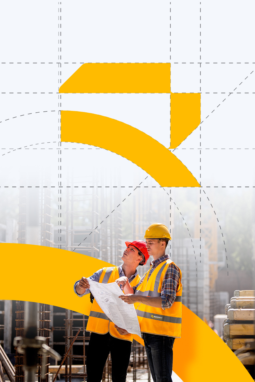 rashinconstruction-manager-engineer-dressed-orange-work-vests-hard-helmets-explore-construction-documentation-building-site-near-steel-frames